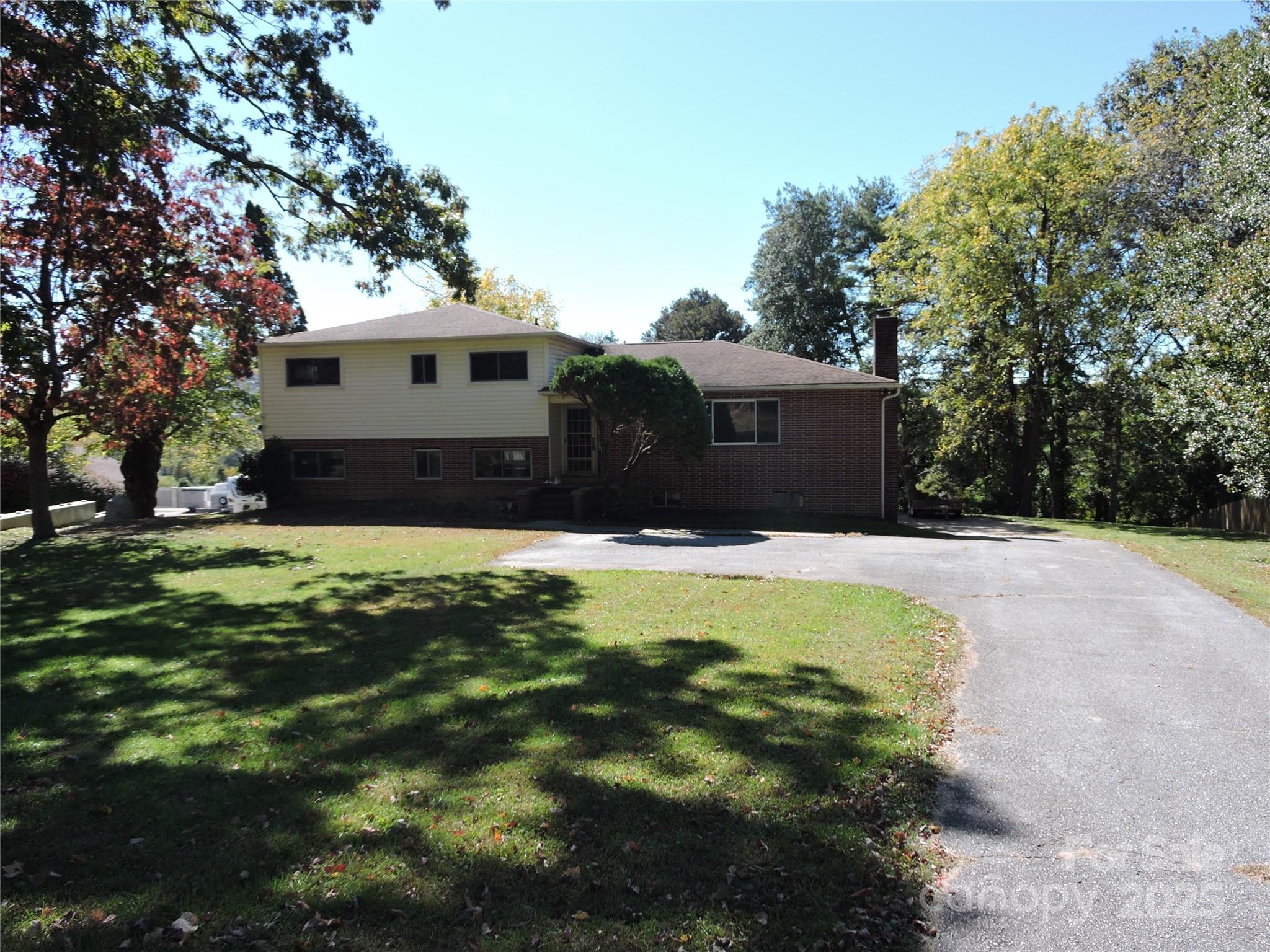 324 Whispering Hills Drive, Hendersonville, NC. property listing photo