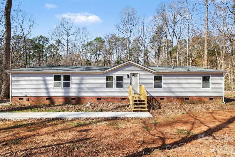 5050 Park Creek Drive, Mount Holly, NC - 5 beds, 3 baths, 2,126 sqft - $375,000