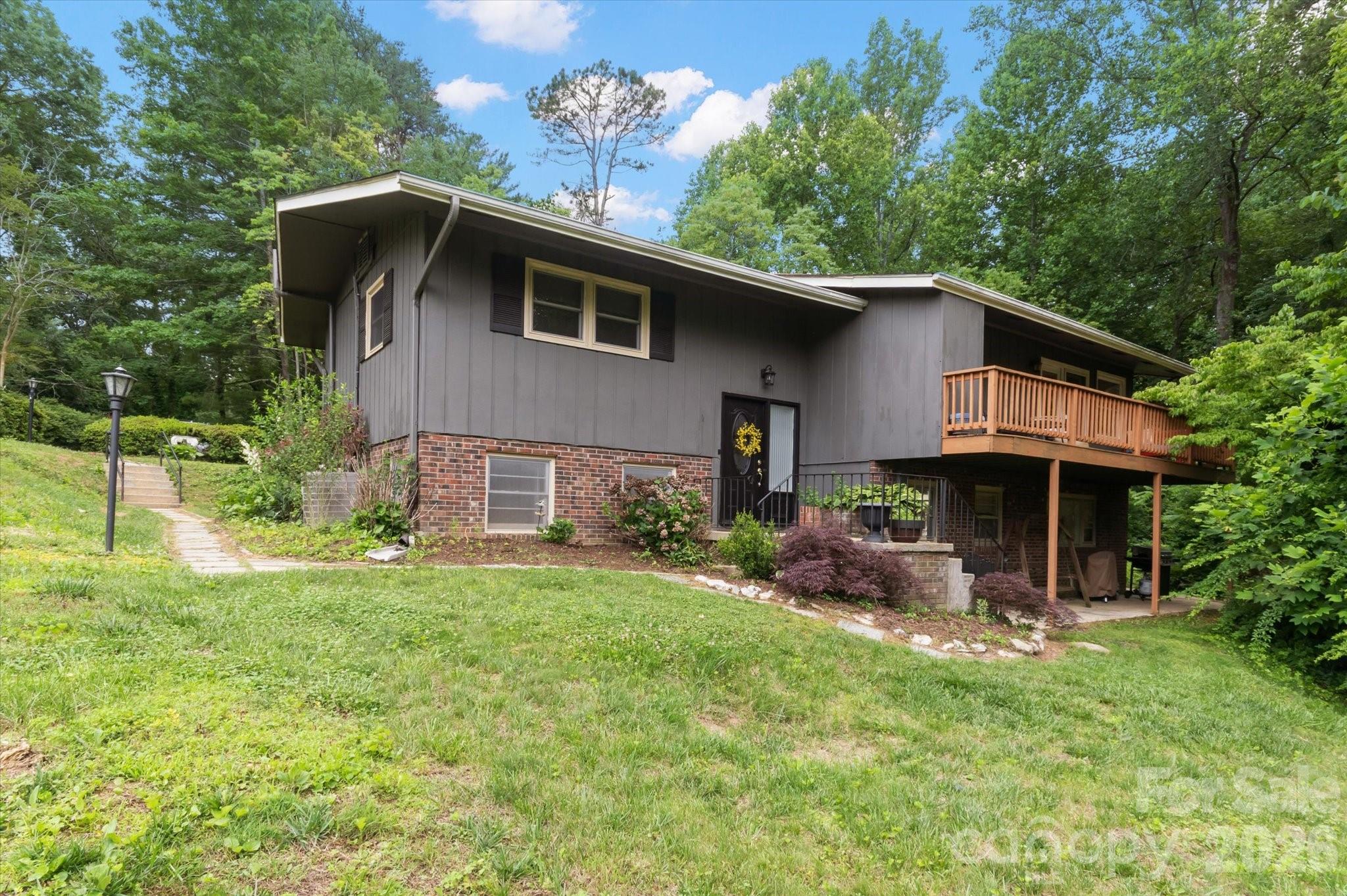 132 E Whisperwood Circle, Hendersonville, NC. property listing photo